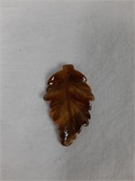 NATURAL HAND CARVED TIGER EYE WHICH AIDS BOTH THE