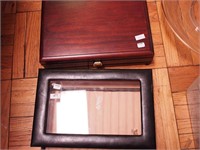 Two jewelry boxes including a leather Wolfe