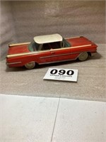 Vintage Oldsmobile Tin Car