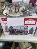 Christmas village greenhouse and villagers