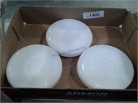 Milkglass saucers, set of 9