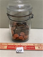 SEALED JAR WITH PENNIES