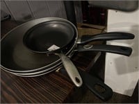 large 3 skillets and small skilet