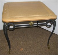 Wrought iron and brass base table with oak top.