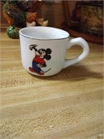 Vtg stoneware cup featuring Mickey Mouse and