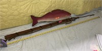 Decorative harpoon and wooden fish