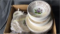 Box of vintage gold and violet dishes