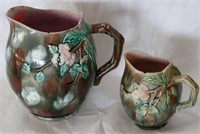 TWO ETRUSCAN MAJOLICA PITCHERS W/ APPLE