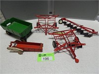 Toy farm equipment items; missing pieces/parts