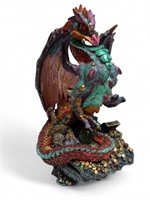 Brightly Colored dragon sculpture on treasure