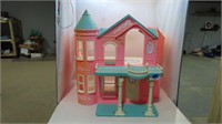 large plastic dollhouse