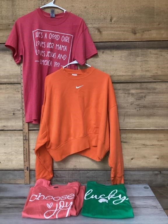 Small T-shirts and Nike hoodie