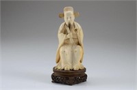 CHINESE CARVED IVORY SCHOLAR FIGURE