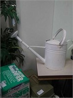 White metal watering pail