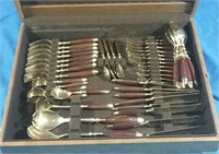 Wood handled flatware in chest