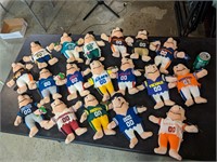 Collection of Fred Flintstone NFL Dolls