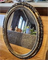 Oval wall mirror, plastic frame