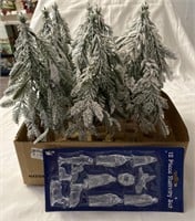 12 small snowflocked 12” Christmas trees &