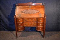 Mahogany carved slant front desk with fitted inter