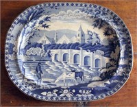 Platter with blue transfer pattern of fishermen,