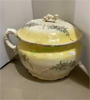 Antique chamber pot with lid. Just had a small
