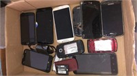 lot of broken cell phones