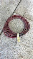 Red rubber hose with connections