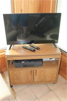 RCA TV 32" & Cabinet on Wheels & VHS Player
