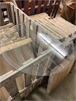 Two pieces of new 26 inch table top glass. These