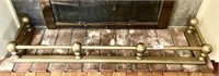 Early hammered brass fireplace fender