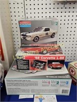 FOUR COLLECTIBLE CAR MODELS