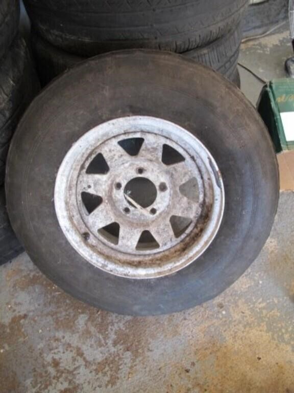 2 SPARE TRAILER TIRES. 14 INCH 5 LUG RIMS