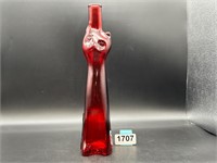 Tall slinder red cat bottle