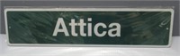 Attica metal sign. Measures: 4" H x 17" W.
