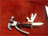 Like new Multi tool. Hammer/knife/pliers/&more.