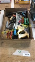 Screwdrivers, saw, level, pliers, assorted tools