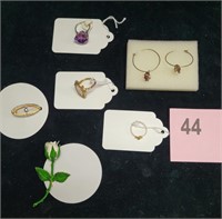 Assortment of Jewelry Brooches, Rings, & Earrings