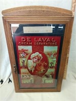 Antique cabinet w/new De leval separator sign