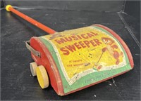 (E) Vintage Fisher-Price Musical Sweeper Toy. 27