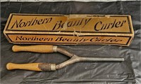 old curling iron with box