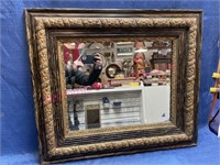 Heavy wall mirror in antique frame
