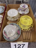 Four footed china cups/saucers