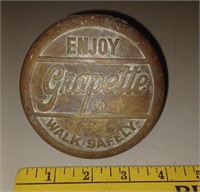 1940s brass GRAPETTE SODA sign sidewalk marker