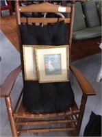 Black cushioned rocking chair