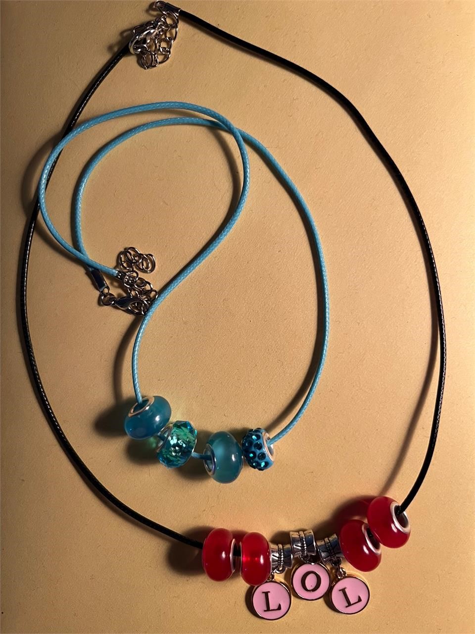 2 Necklaces made by 7 year old Client