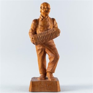 CARVED MUSICIAN BY ROBERT ROY