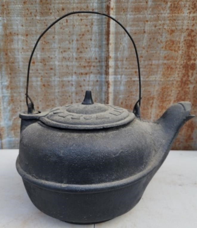 Vintage cast iron tea kettle