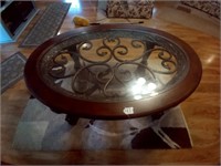metal scroll with glass coffee table