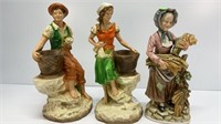 2 Universal Statuary figurines (woman has been