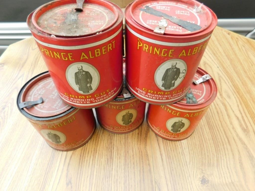 Five Prince Albert tobacco cans